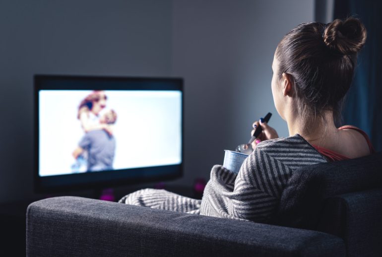 Woman,Watching,Romantic,Movie,And,Eating,Ice,Cream.,Sad,Lonely