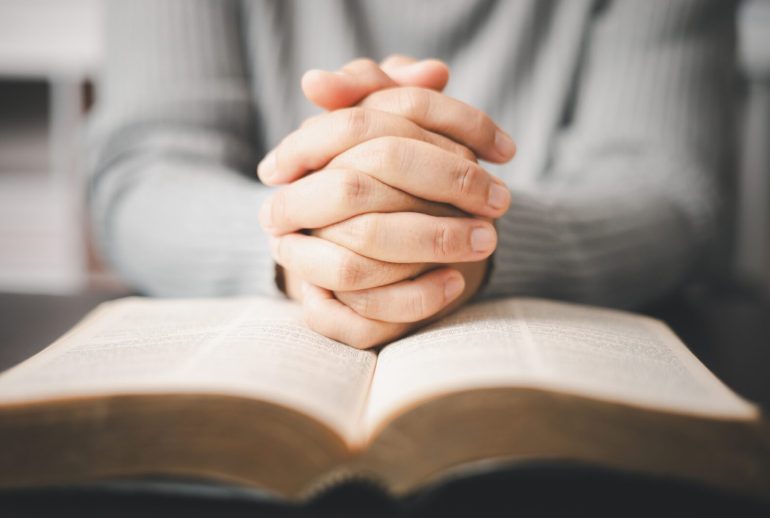 Christian,Woman,Reading,Bible,In,Ancient,Catholic,Temple.,Devout,Christian